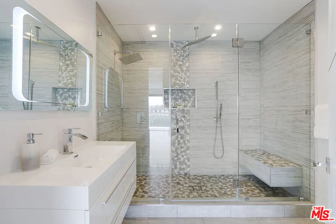8401 Wyndham Road Los Angeles, CA 90046 - Photo 8 of 34 a bathroom with a sink a toilet and shower