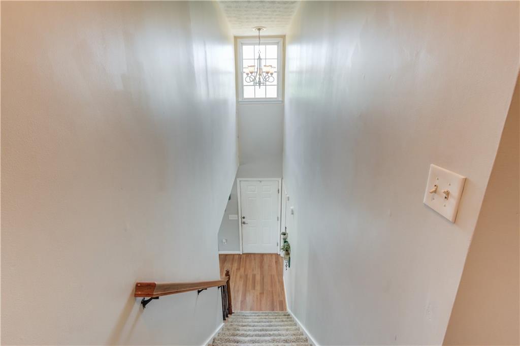 204 Angie Way Bethlehem, GA 30620 - Photo 25 of 42 a view of a hallway with wooden floor