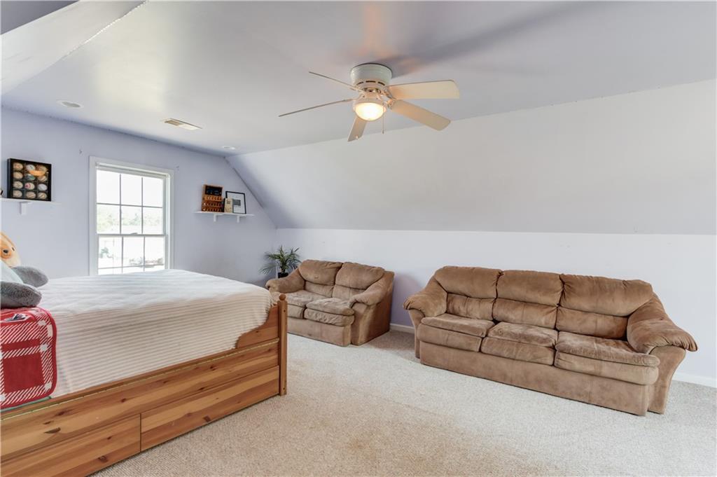 204 Angie Way Bethlehem, GA 30620 - Photo 31 of 42 a bedroom with furniture and window
