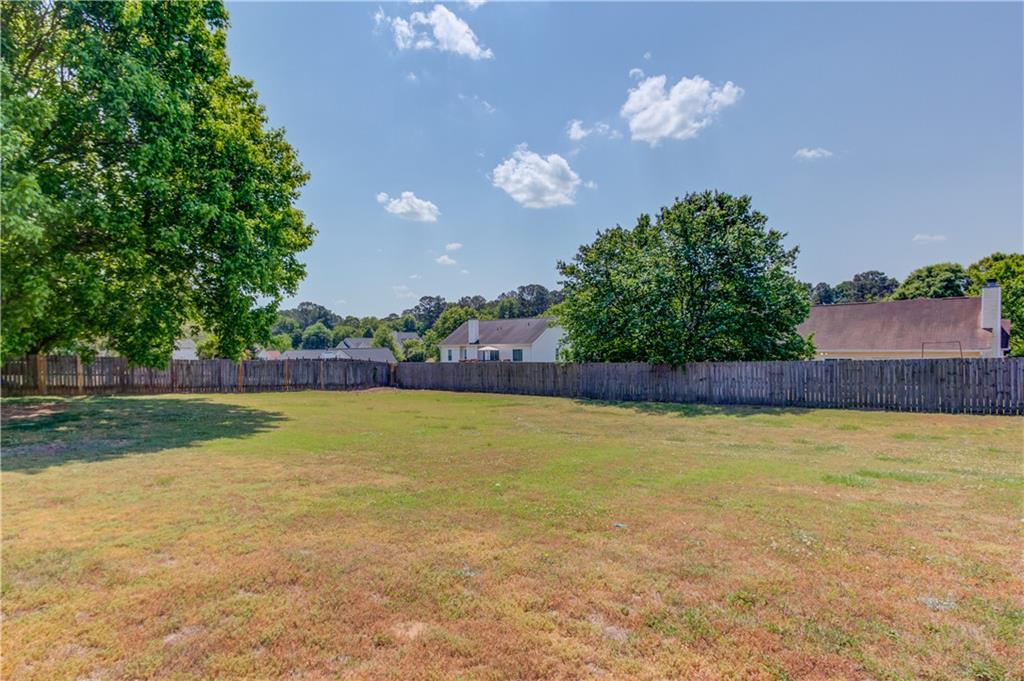 204 Angie Way Bethlehem, GA 30620 - Photo 35 of 42 a view of a swimming pool and trees in the background