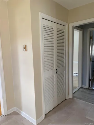 a view of a room that has a window in it