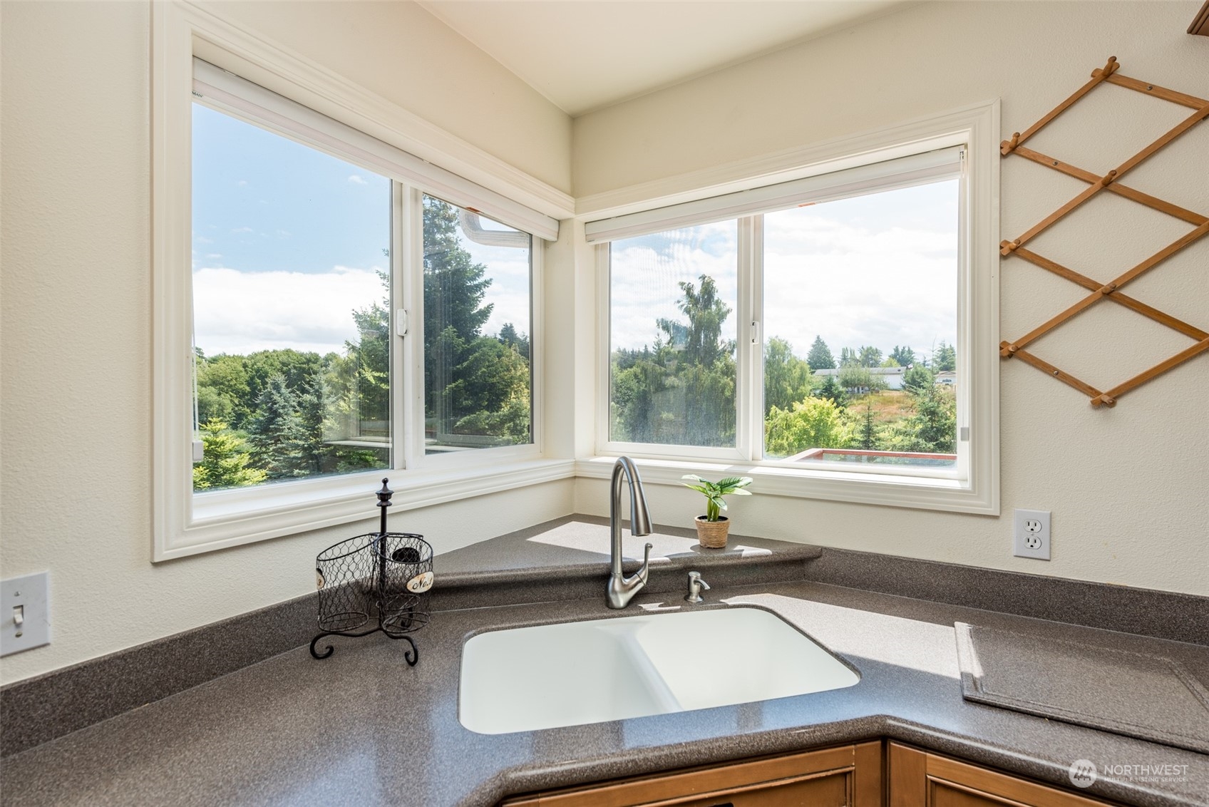 322 Ridge View Drive Sequim, WA 98382 - Photo 11 of 40 a white bath tub sitting in a bathroom next to a window