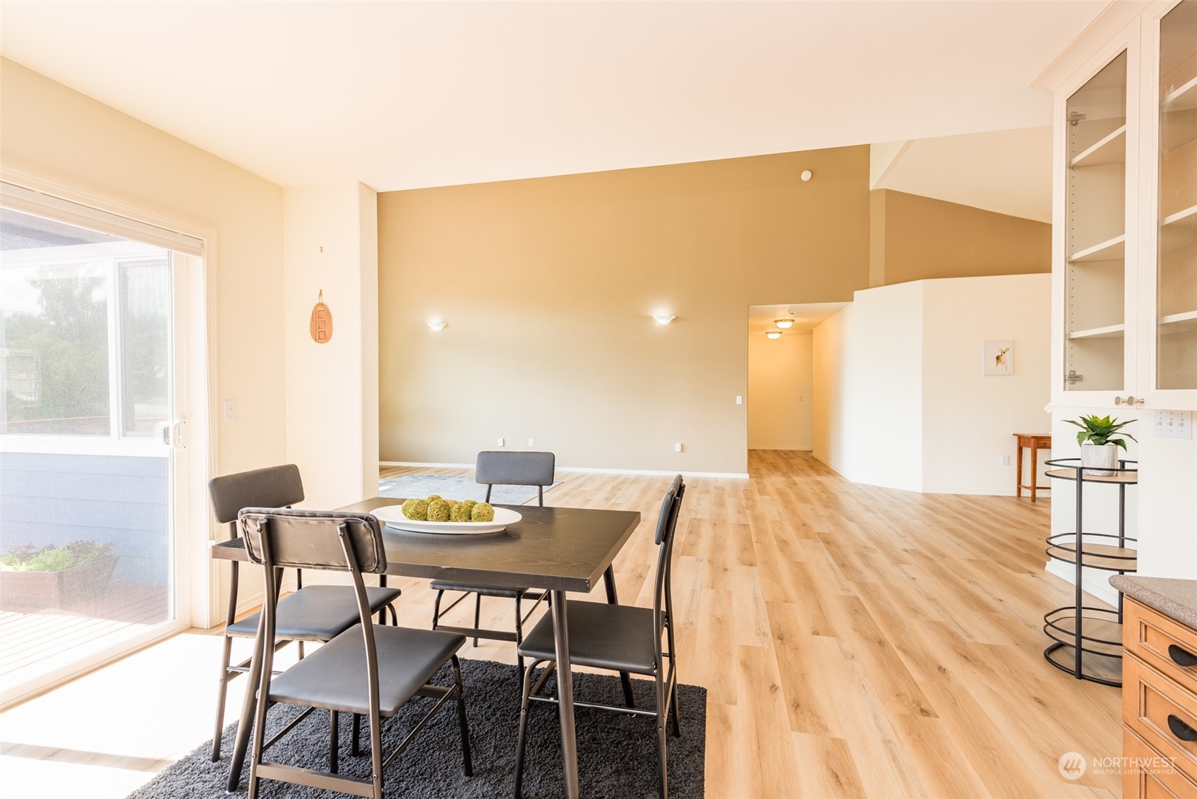322 Ridge View Drive Sequim, WA 98382 - Photo 15 of 40 a view of a dining room with furniture and wooden floor