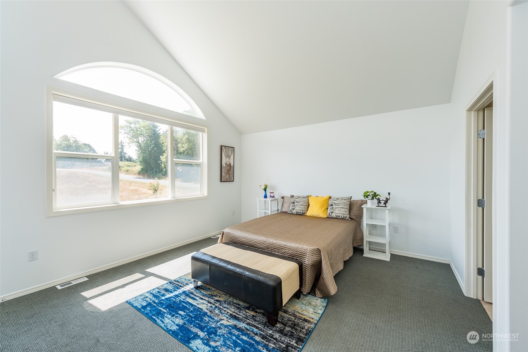 322 Ridge View Drive Sequim, WA 98382 - Photo 20 of 40 a bed room with a bed and a window
