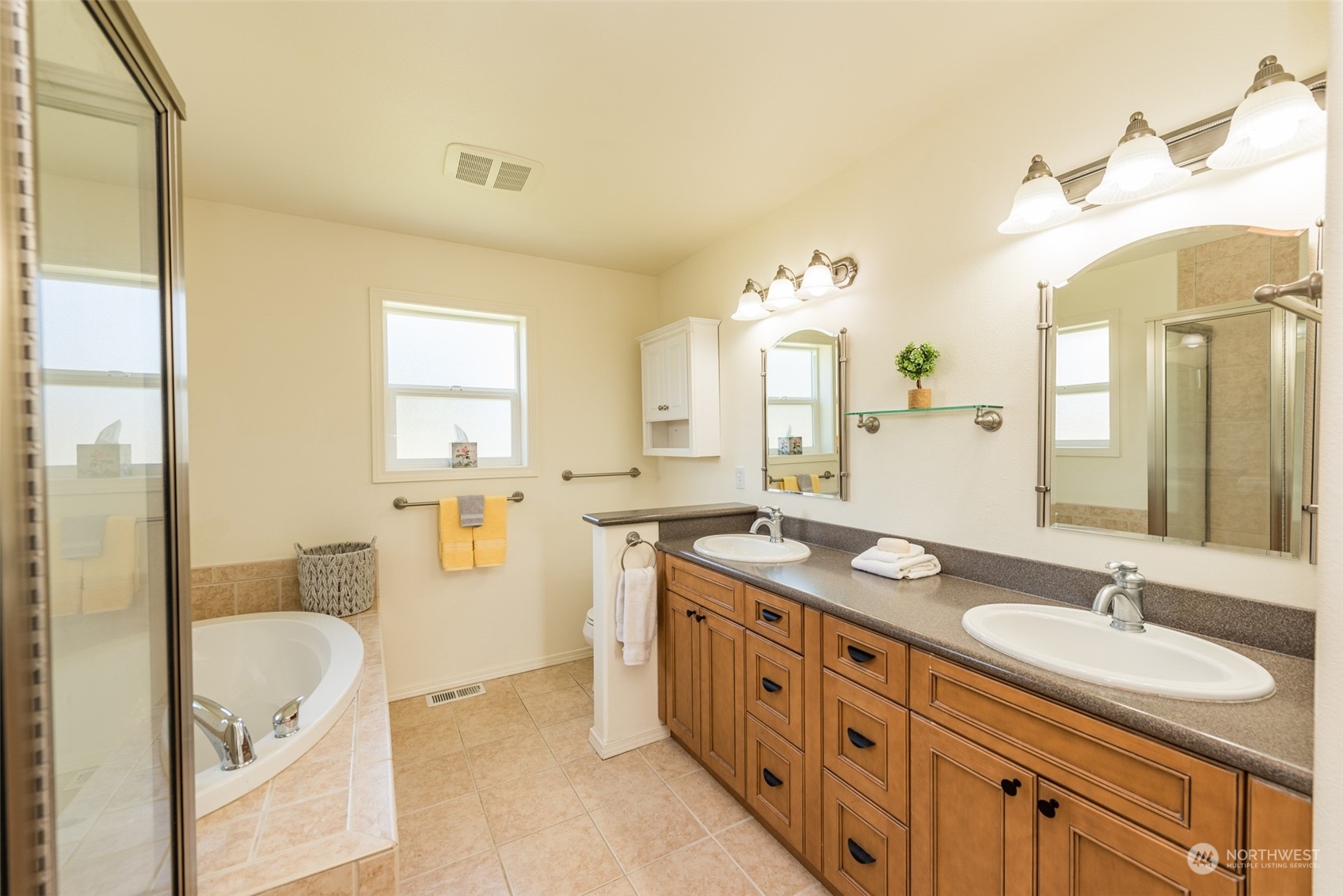 322 Ridge View Drive Sequim, WA 98382 - Photo 23 of 40 a bathroom with a granite countertop sink mirror and a