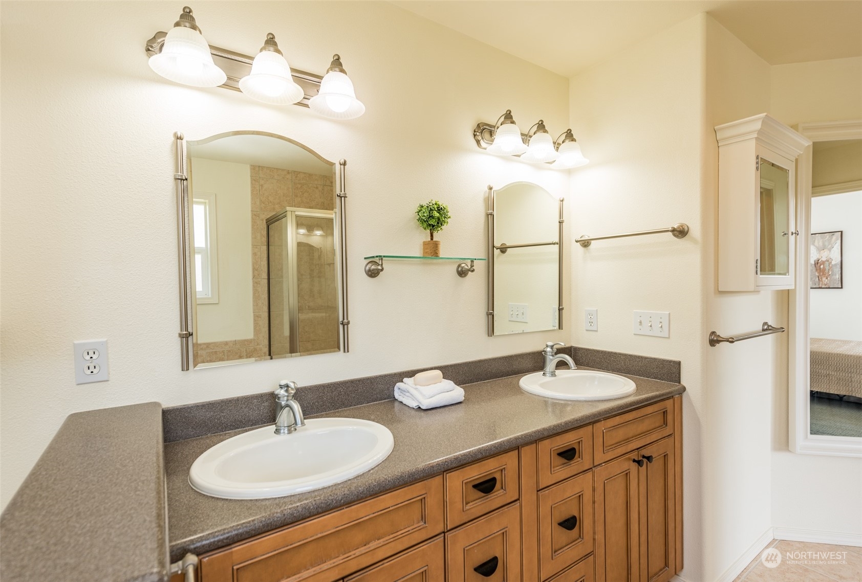 322 Ridge View Drive Sequim, WA 98382 - Photo 29 of 40 a bathroom with a sink double vanity and a mirror