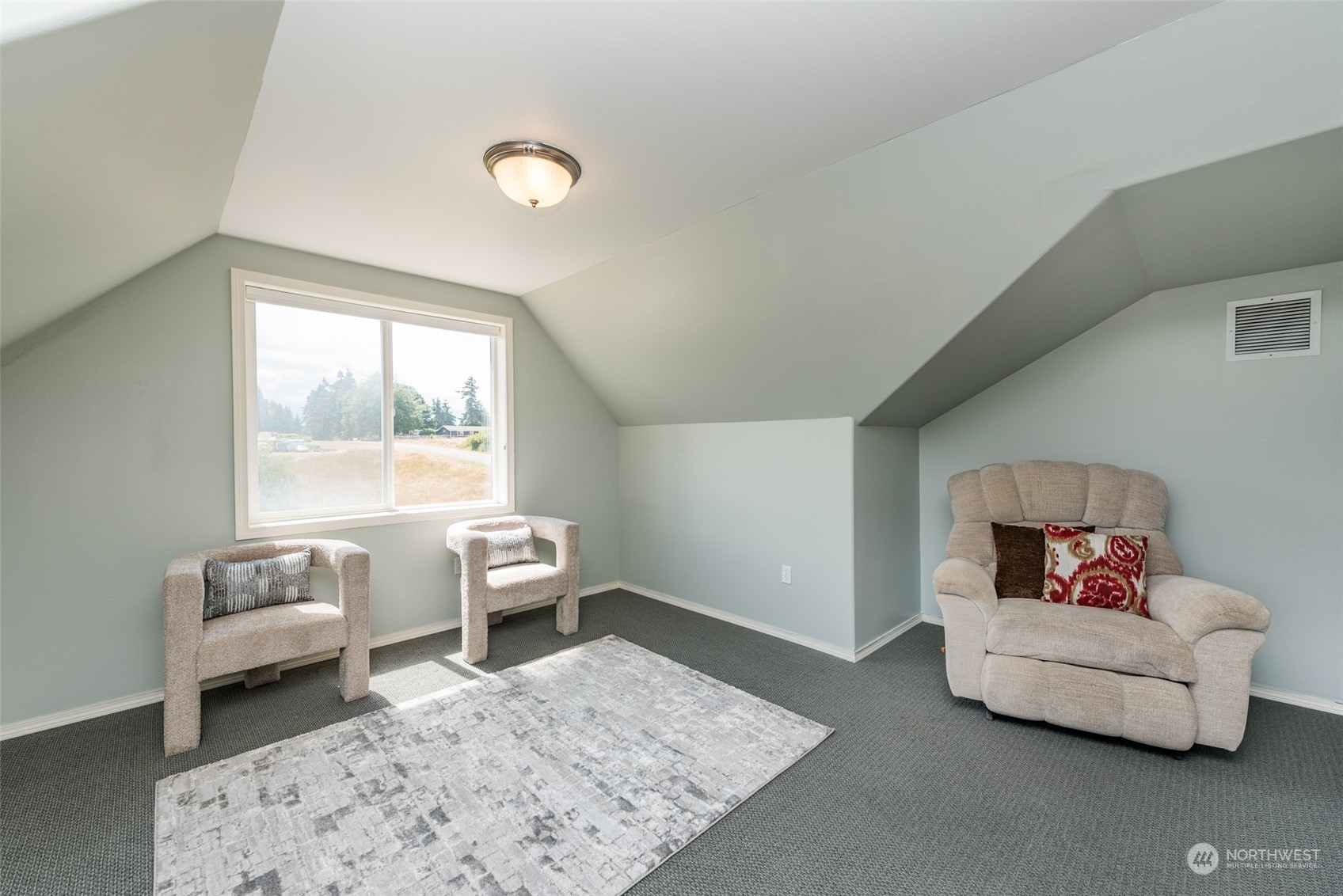322 Ridge View Drive Sequim, WA 98382 - Photo 32 of 40 a living room with furniture and a window