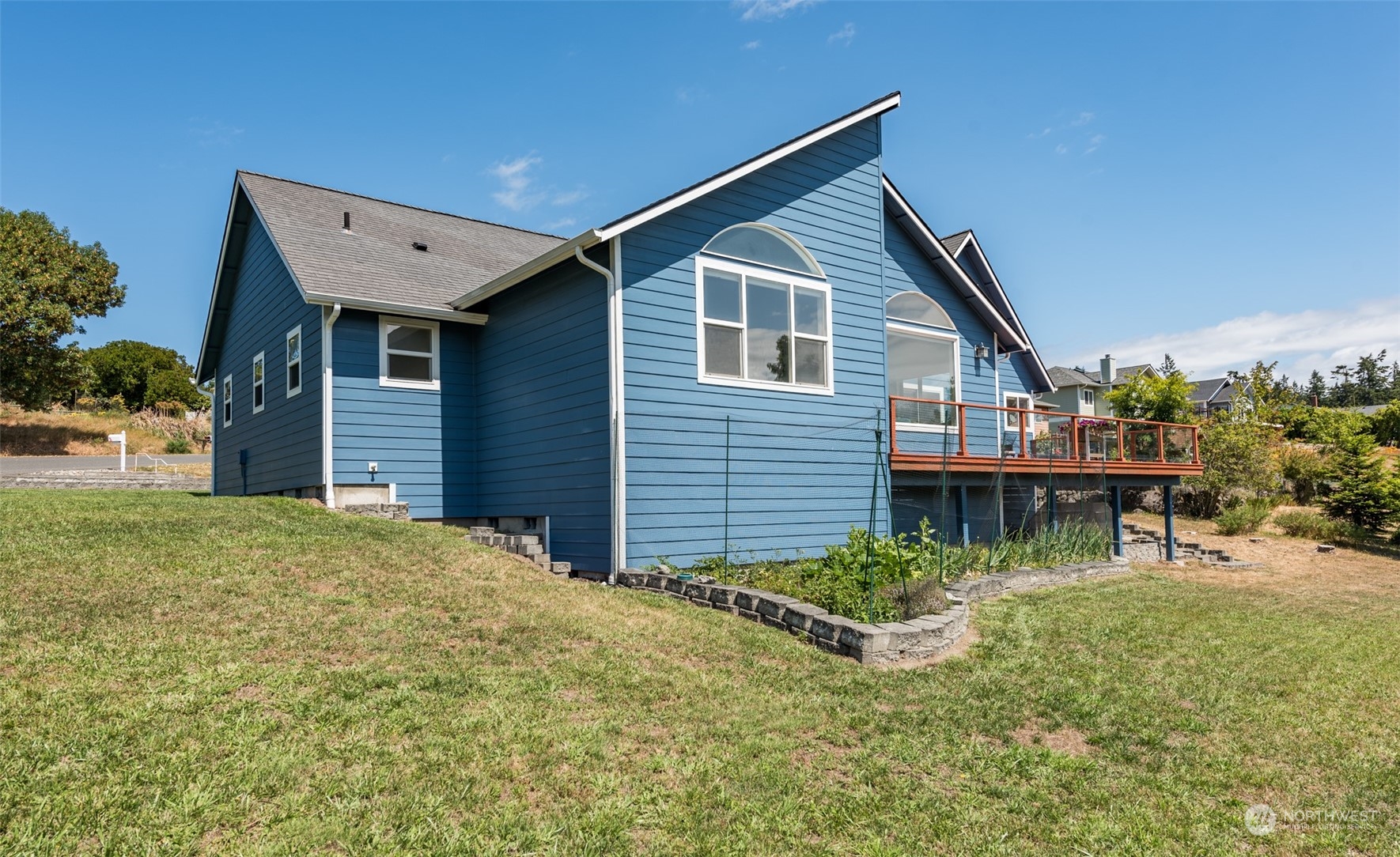 322 Ridge View Drive Sequim, WA 98382 - Photo 36 of 40 a view of a house with a yard