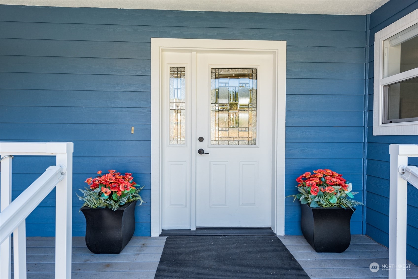 322 Ridge View Drive Sequim, WA 98382 - Photo 4 of 40 a house with a lot of flowers