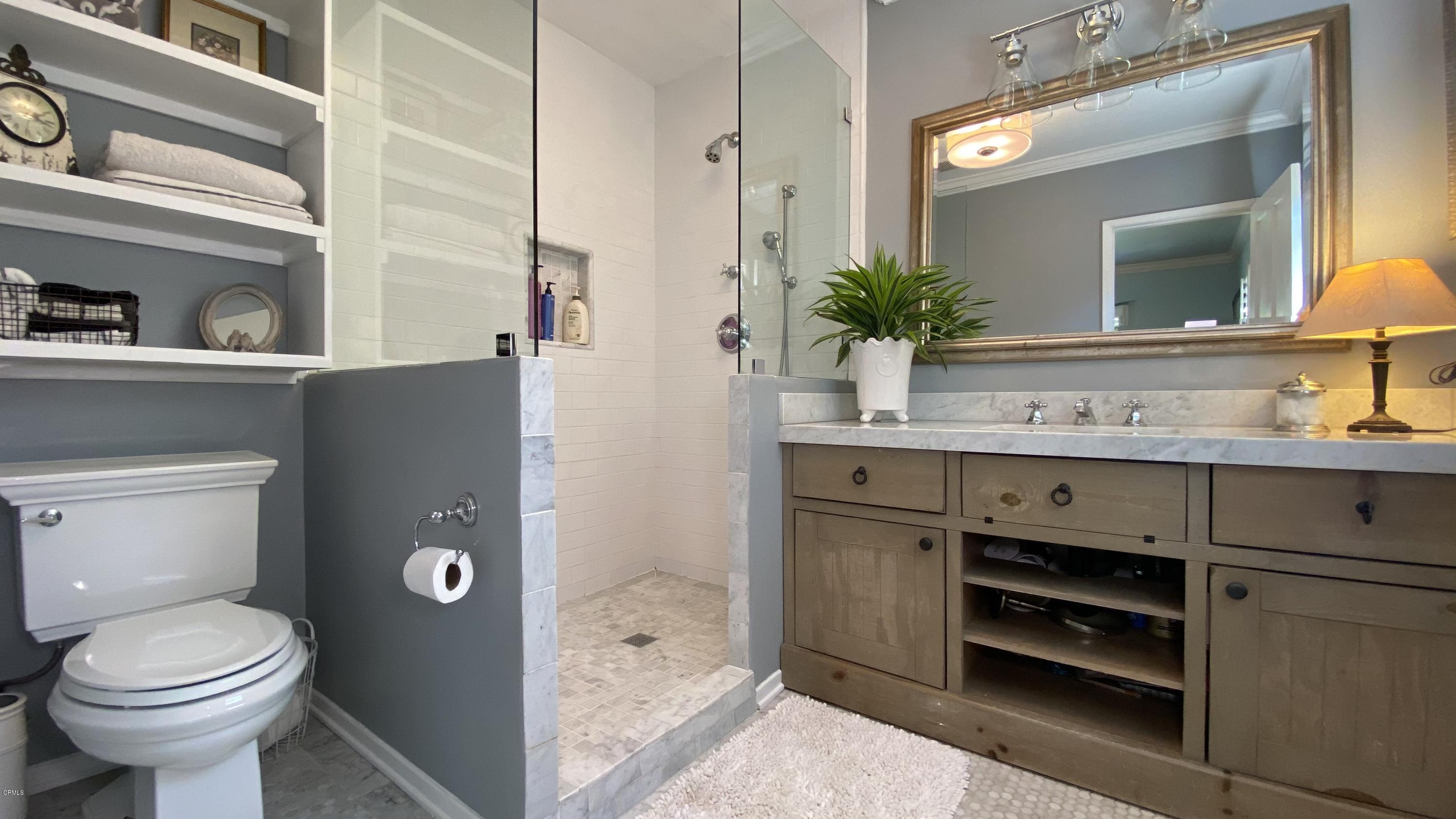 1644 Morada Place Altadena, CA 91001 - Photo 23 of 74 a bathroom with a sink and a mirror