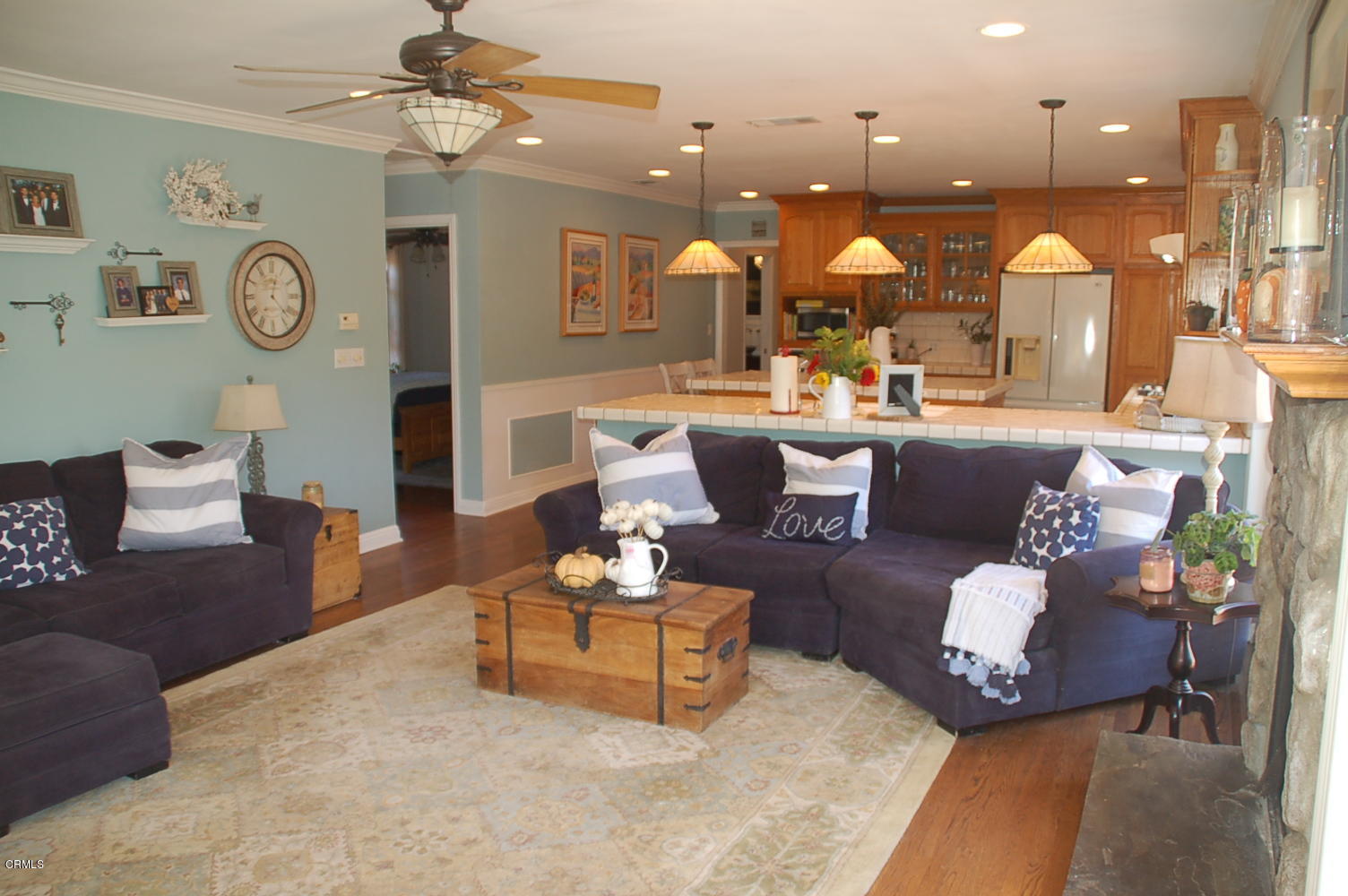 1644 Morada Place Altadena, CA 91001 - Photo 40 of 74 a living room with couches and a dining table with kitchen view