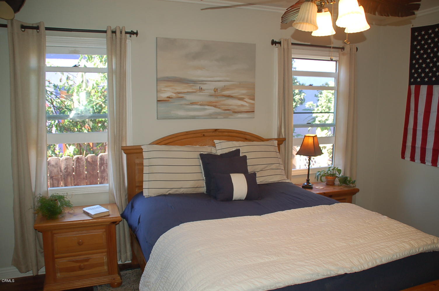 1644 Morada Place Altadena, CA 91001 - Photo 41 of 74 a bedroom with a bed and wooden floor