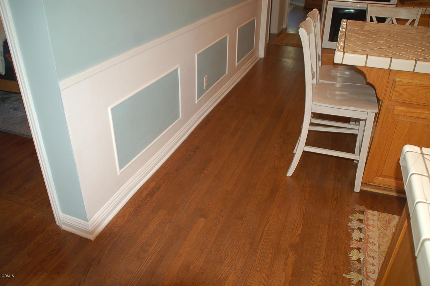 1644 Morada Place Altadena, CA 91001 - Photo 44 of 74 a view of a hallway with wooden floor and stairs