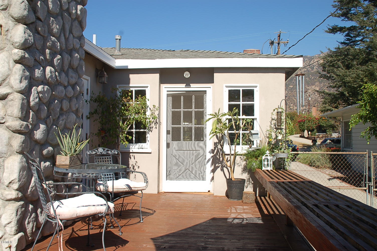 1644 Morada Place Altadena, CA 91001 - Photo 48 of 74 a view of a patio with couches table and chairs and potted plants