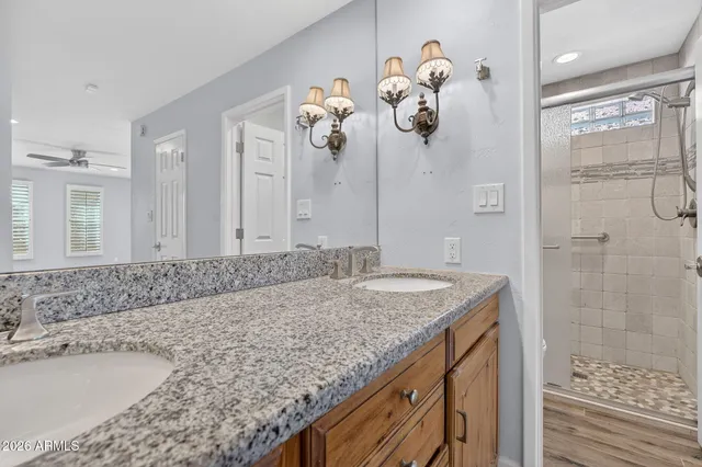 a view of a room with wooden floor and windows