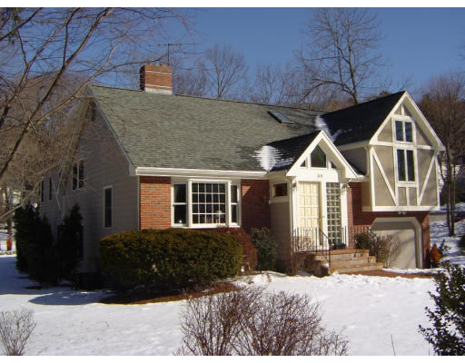 30 Abbott Road Wellesley, MA 02481 - Photo 1 of 17 a front view of a house with a yard