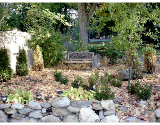 30 Abbott Road Wellesley, MA 02481 - Photo 13 of 17 a view of a garden with a fountain