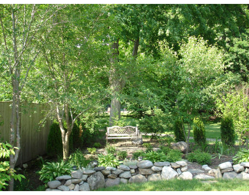 30 Abbott Road Wellesley, MA 02481 - Photo 16 of 17 a backyard of a house with lots of green space
