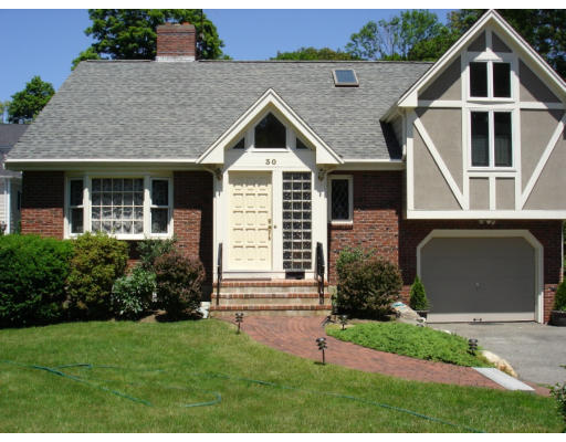 30 Abbott Road Wellesley, MA 02481 - Photo 17 of 17 a front view of house with yard and green space