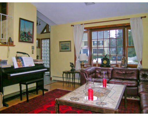30 Abbott Road Wellesley, MA 02481 - Photo 5 of 17 a living room with furniture and a table