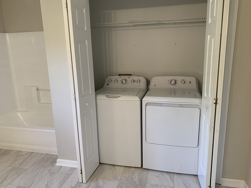 581 Warren Wright Road Belchertown, MA 01007 - Photo 14 of 25 a utility room with dryer and washer