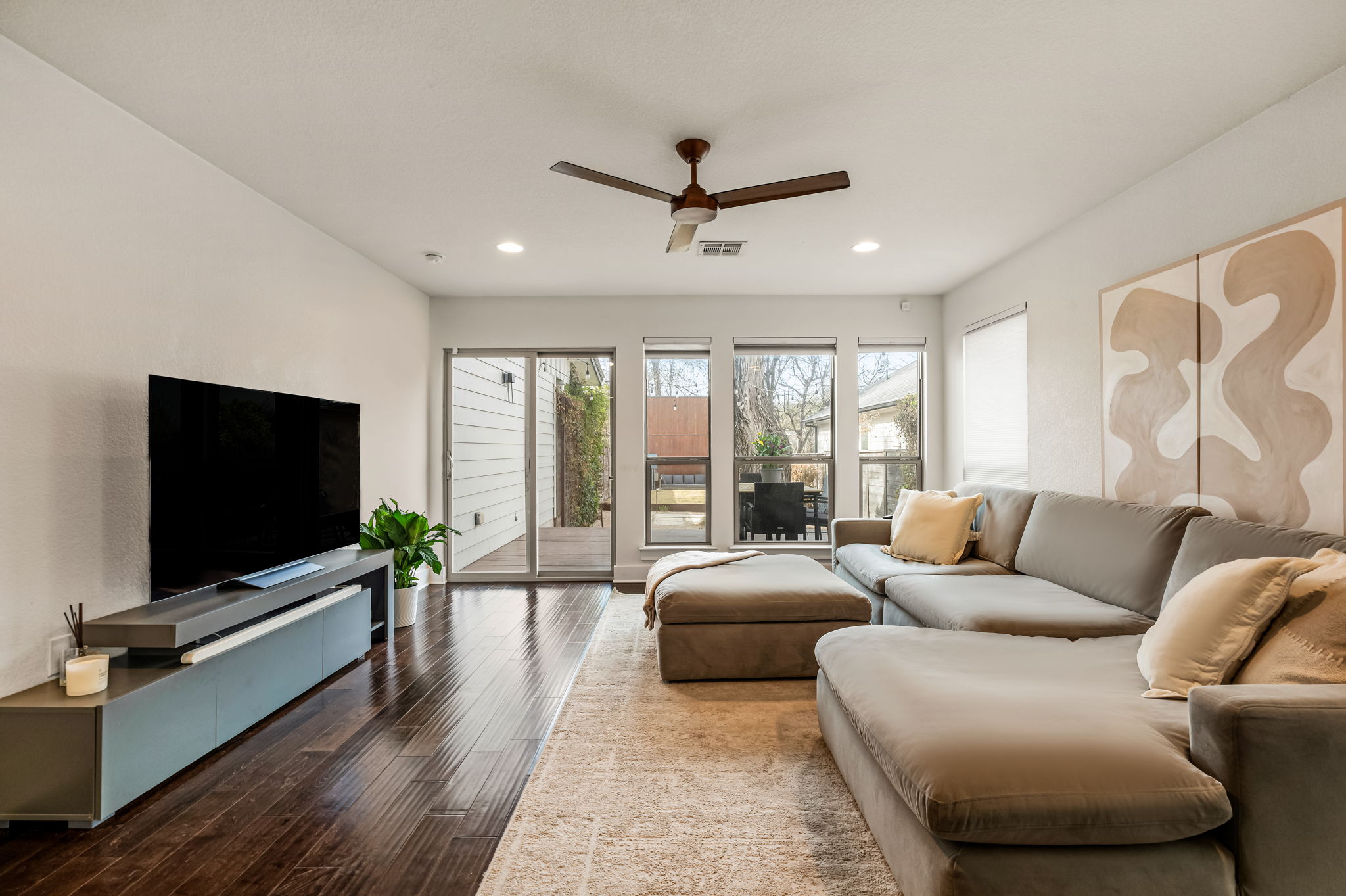 1124 Linden Street, Unit B Austin, TX 78702 - Photo 5 of 26 Living room featuring ceiling fan, wood finished floors, and recessed lighting