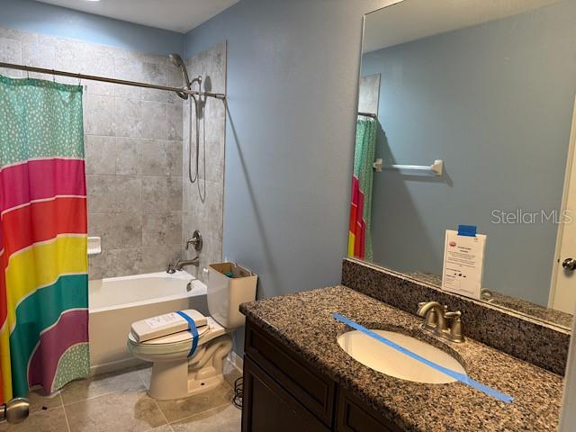 12590 Retreat Place Spring Hill, FL 34610 - Photo 26 of 33 a bathroom with a granite countertop sink and a mirror