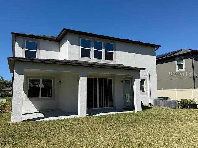 a house view with a outdoor space