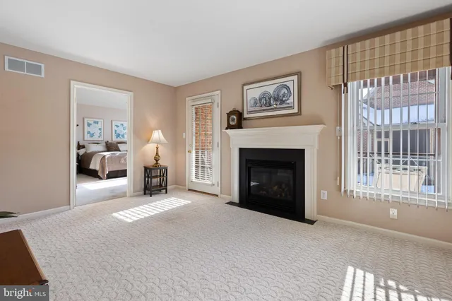 a view of a livingroom with a fireplace