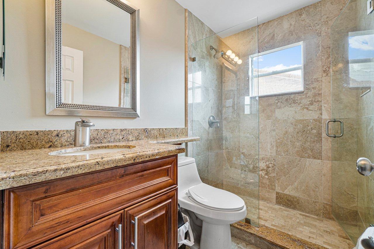 20931 Vía Azalea, Unit 4 Boca Raton, FL 33428 - Photo 18 of 45 Guest Bathroom