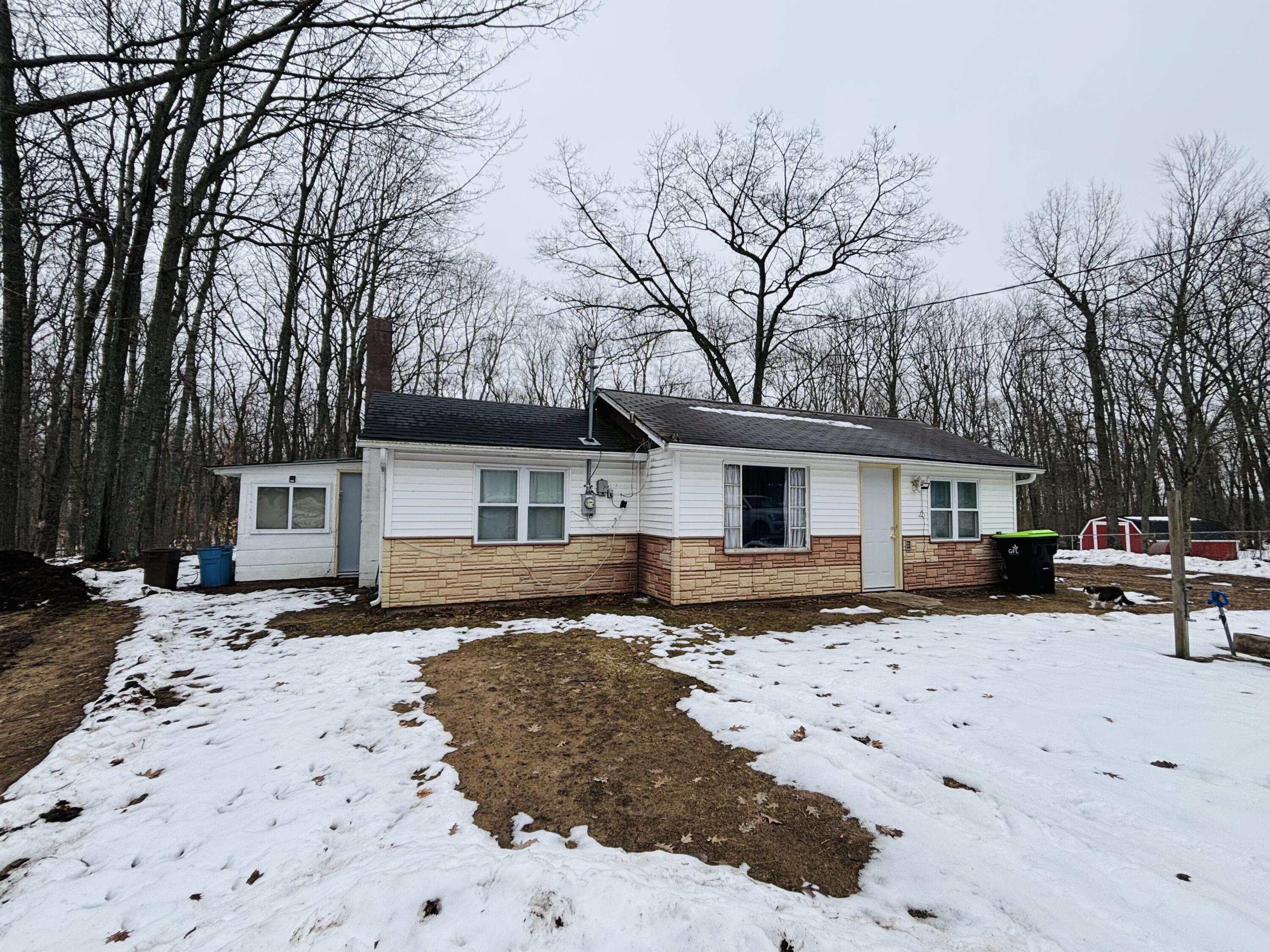 8090 Fir Mac Road Harrison, MI 48625 - Photo 2 of 24 9DFE6449-4326-4FD1-B0CC-94B83C7F816D