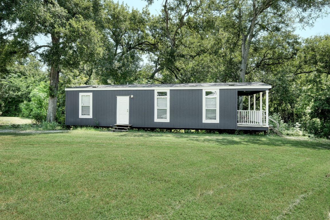 1660 South FM 1660 Taylor, TX 76574 - Photo 15 of 25 a view of a house with a backyard