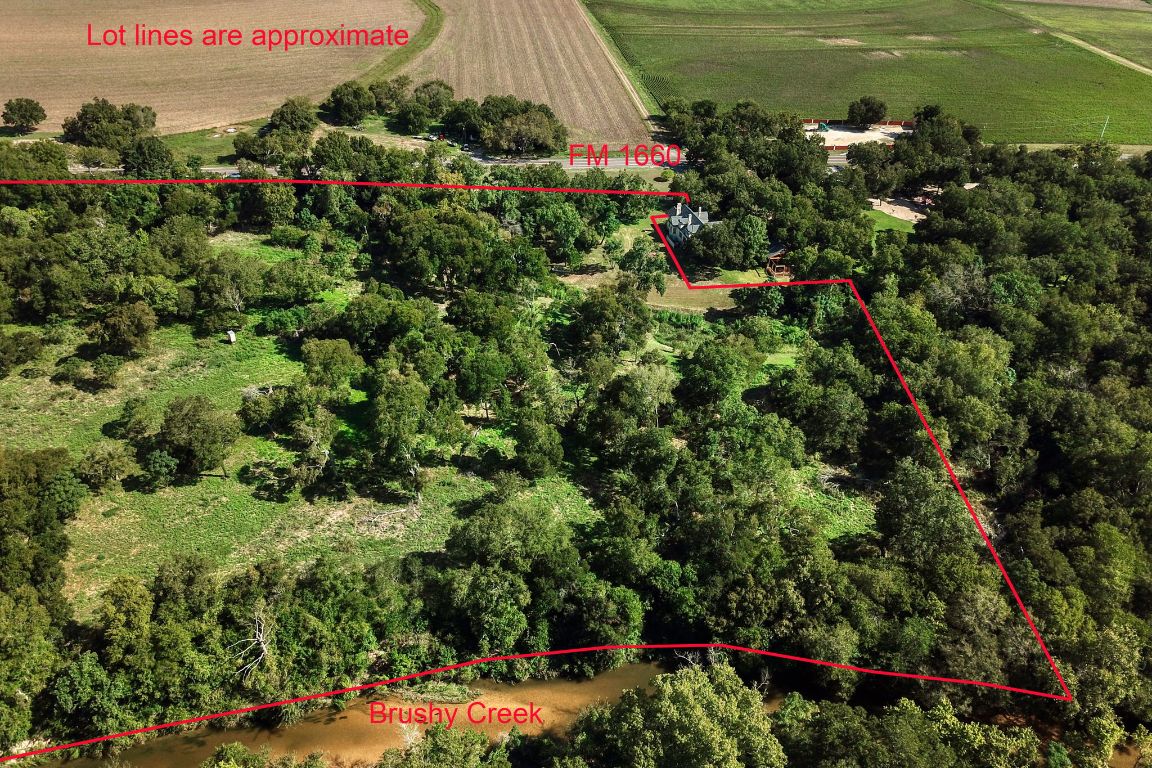 1660 South FM 1660 Taylor, TX 76574 - Photo 4 of 25 an aerial view of a houses with a yard