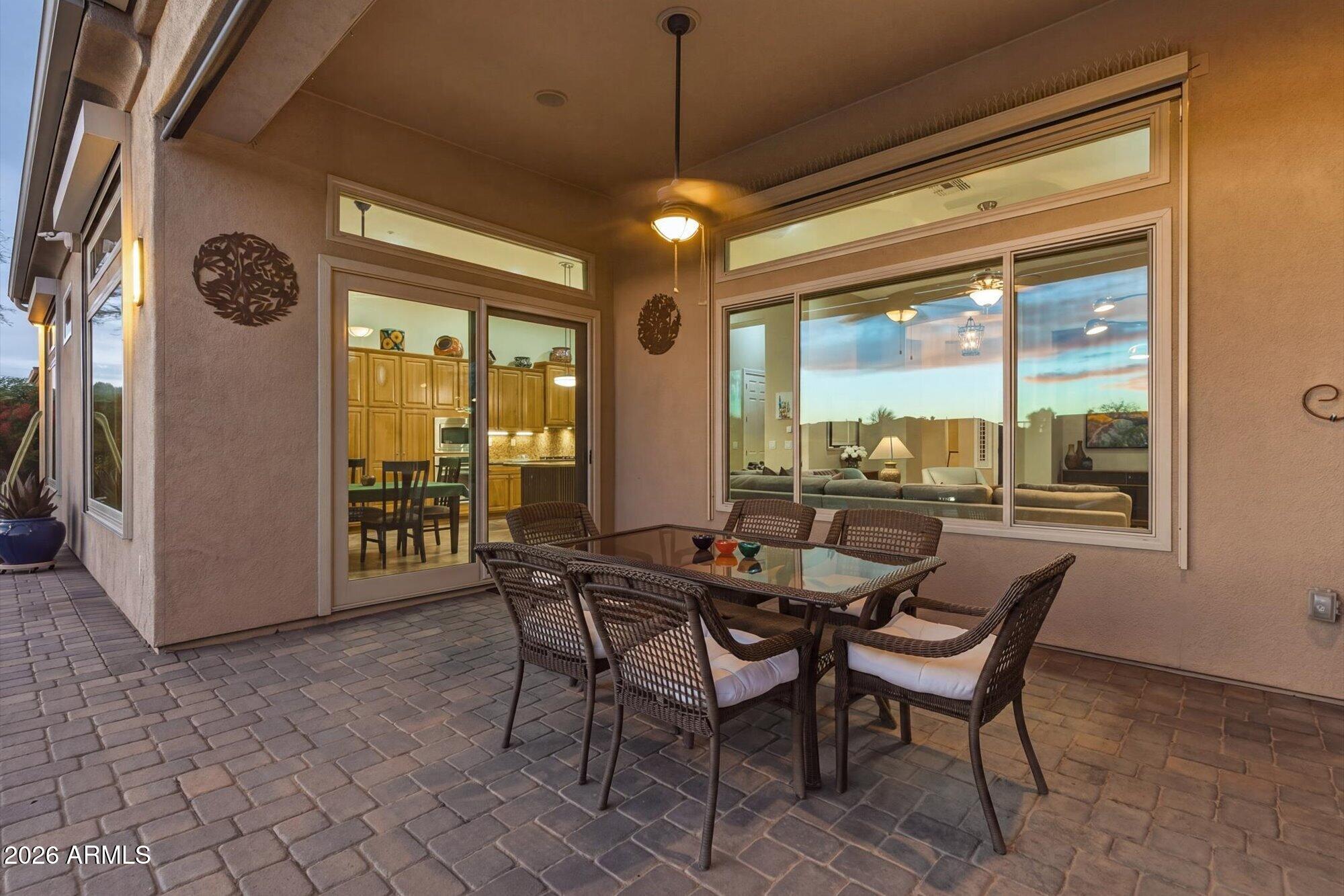 40322 North Hawk Ridge Trail Anthem, AZ 85086 - Photo 48 of 63 a dining room with furniture and window