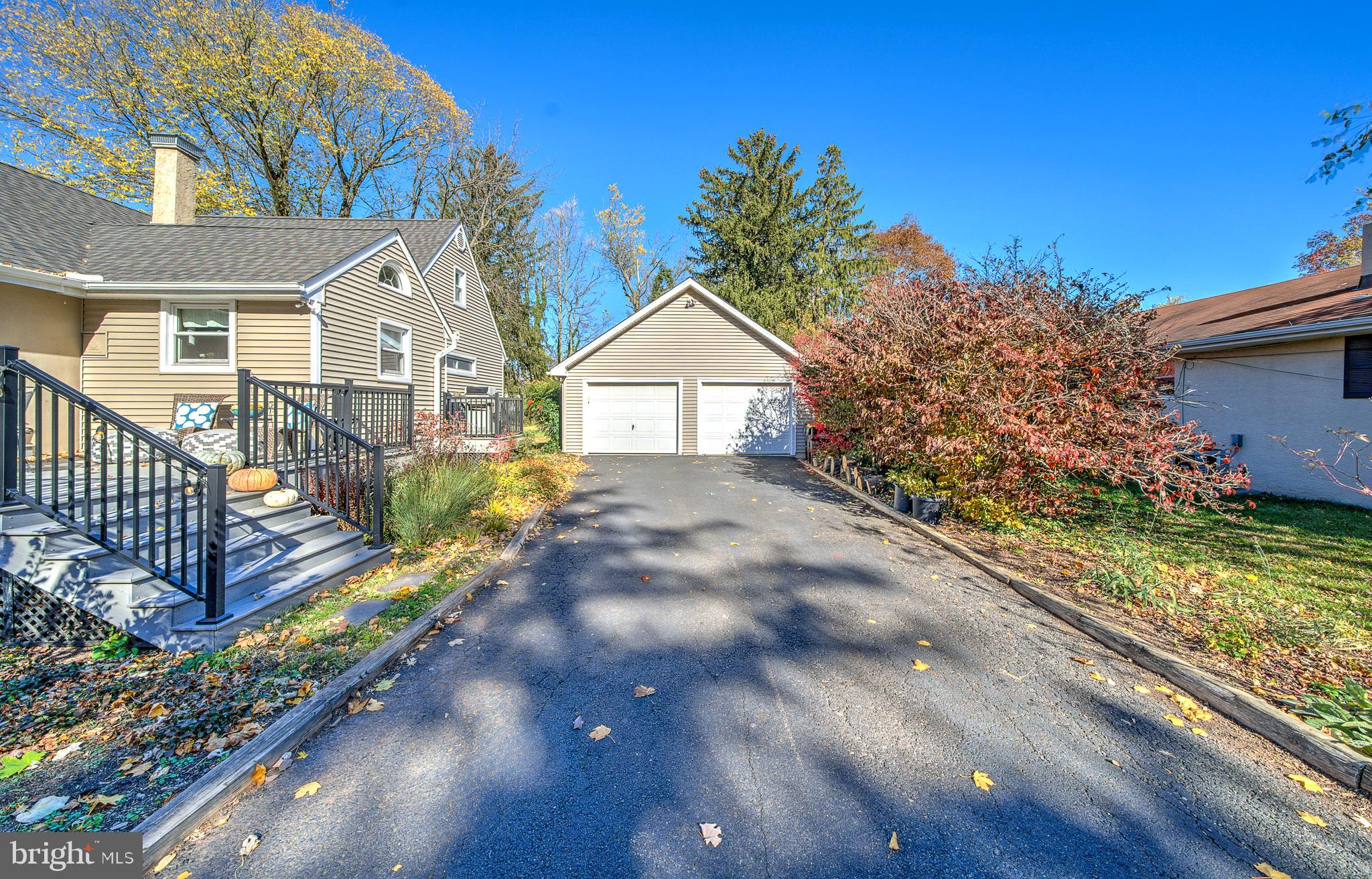 691 Park Road Lansdale, PA 19446 - Photo 13 of 50 a view of a house with a small yard and wooden fence