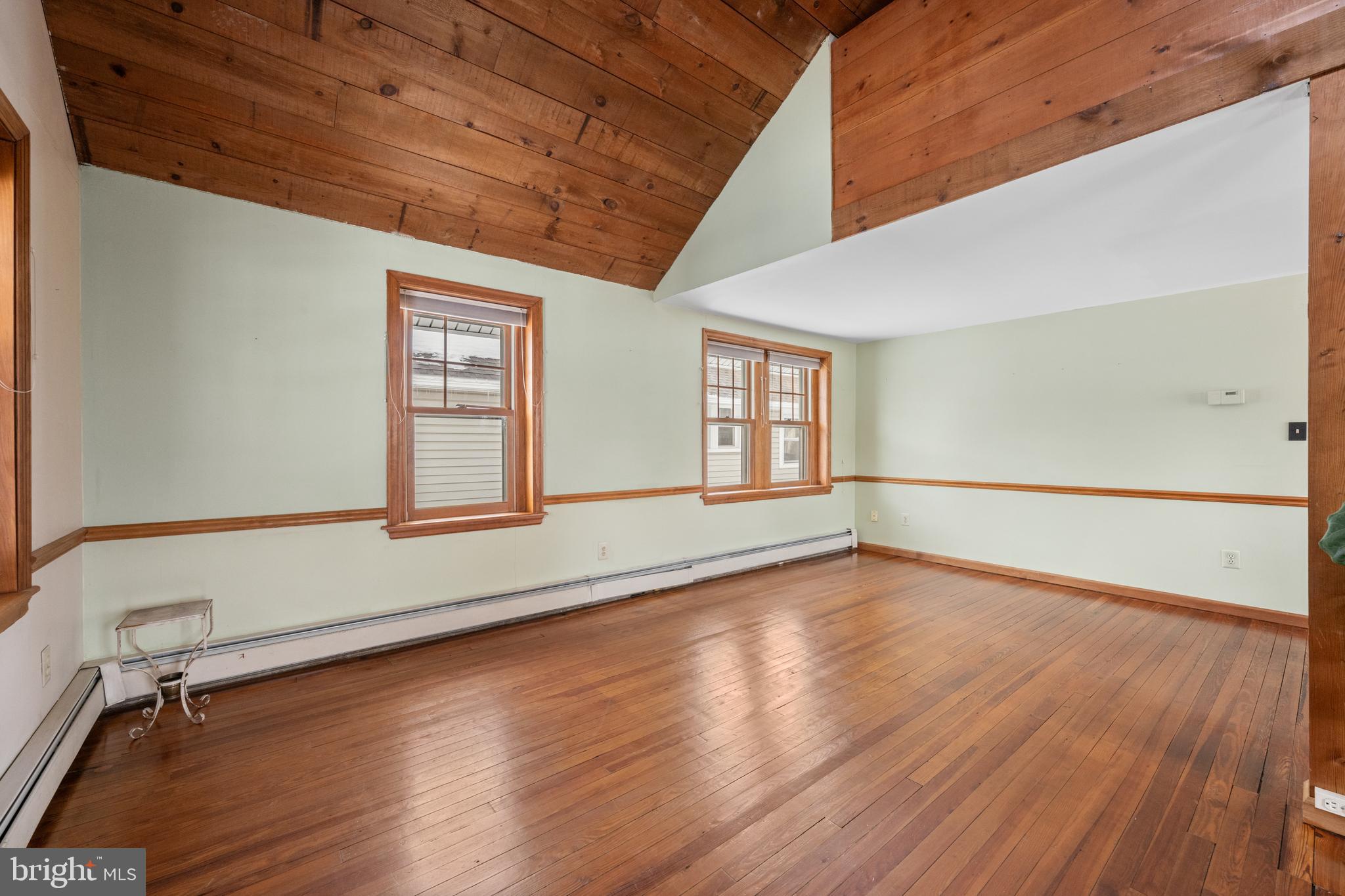 691 Park Road Lansdale, PA 19446 - Photo 16 of 50 a view of an empty room with wooden floor and a window
