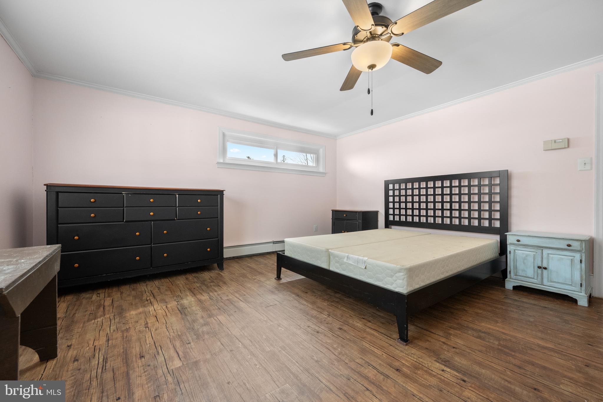 691 Park Road Lansdale, PA 19446 - Photo 31 of 50 a bedroom with a bed and a ceiling fan