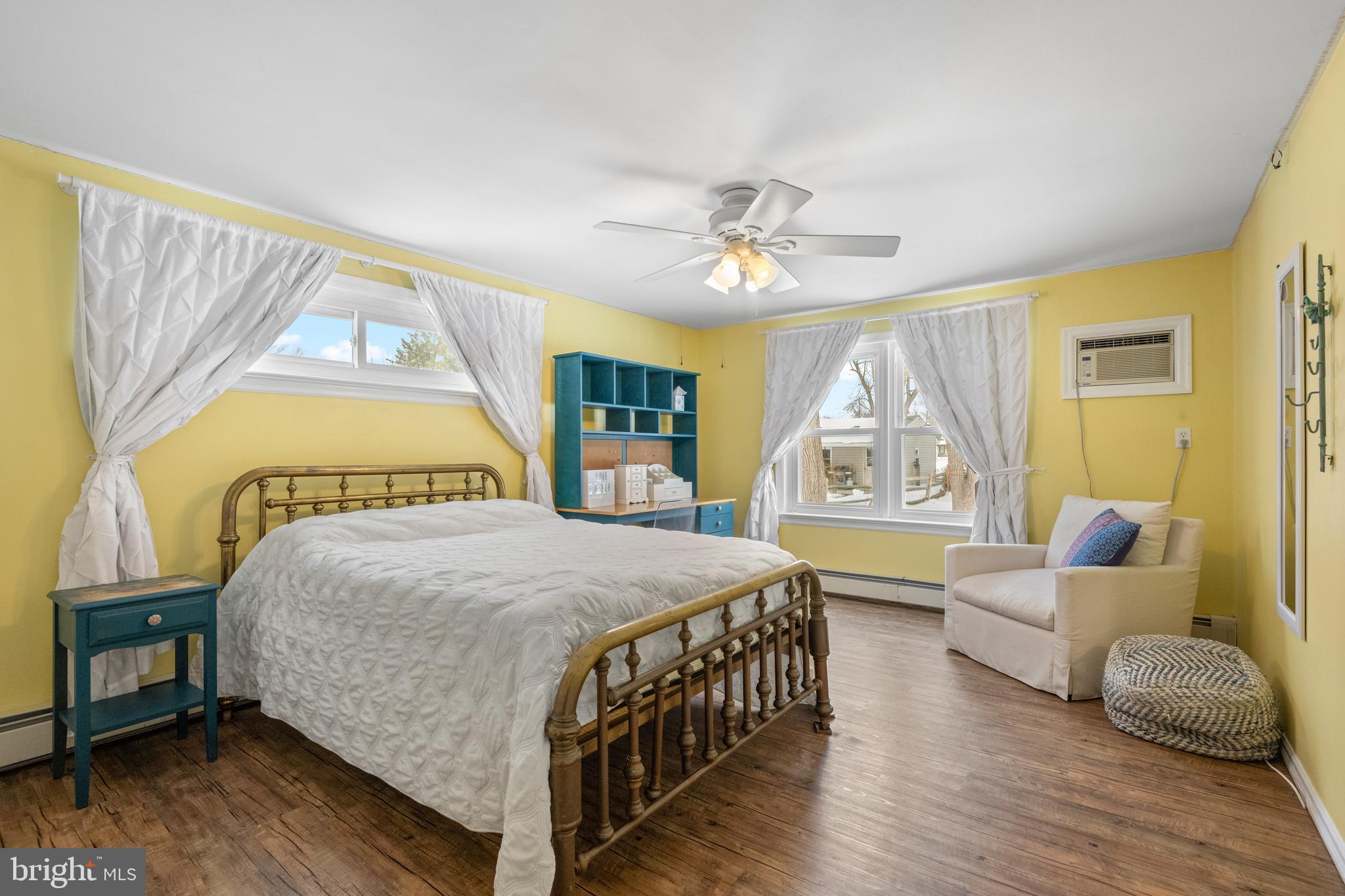 691 Park Road Lansdale, PA 19446 - Photo 34 of 50 a bedroom with a bed a couch and a window with couch