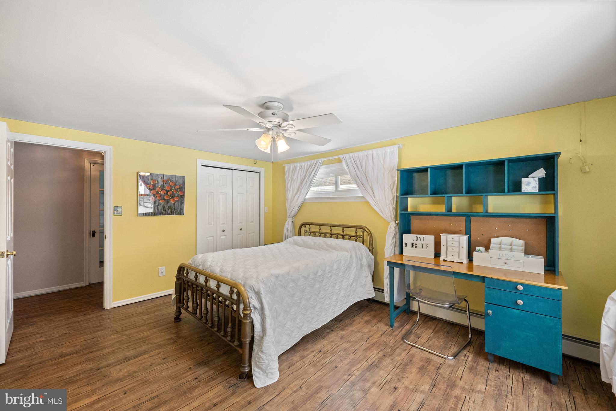 691 Park Road Lansdale, PA 19446 - Photo 35 of 50 a bedroom with a bed and a chair