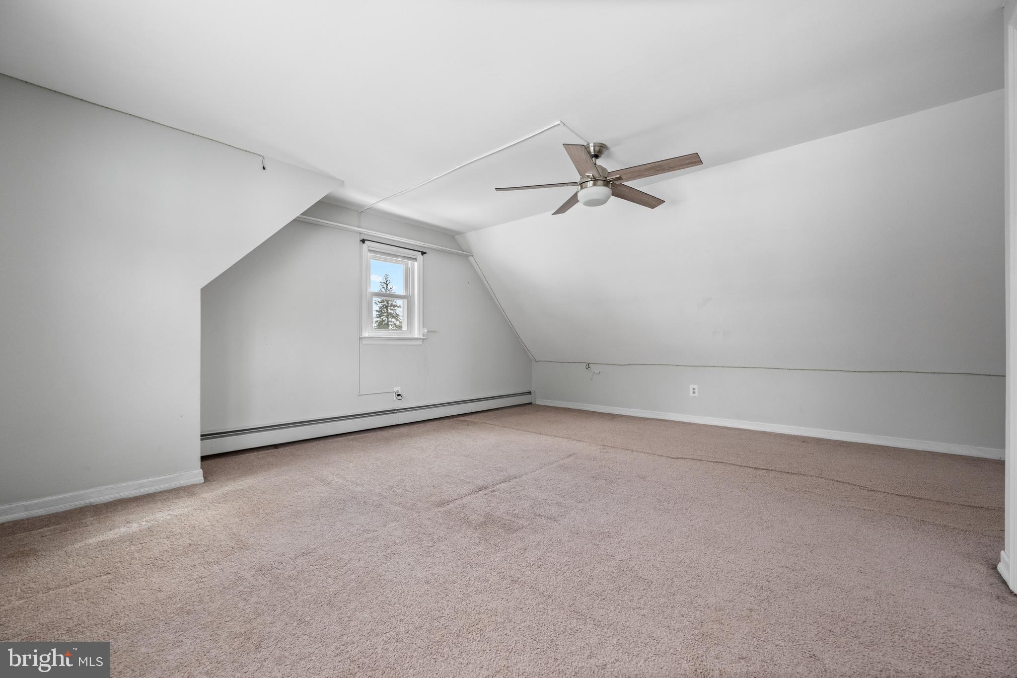 691 Park Road Lansdale, PA 19446 - Photo 45 of 50 an empty room with windows and ceiling fan