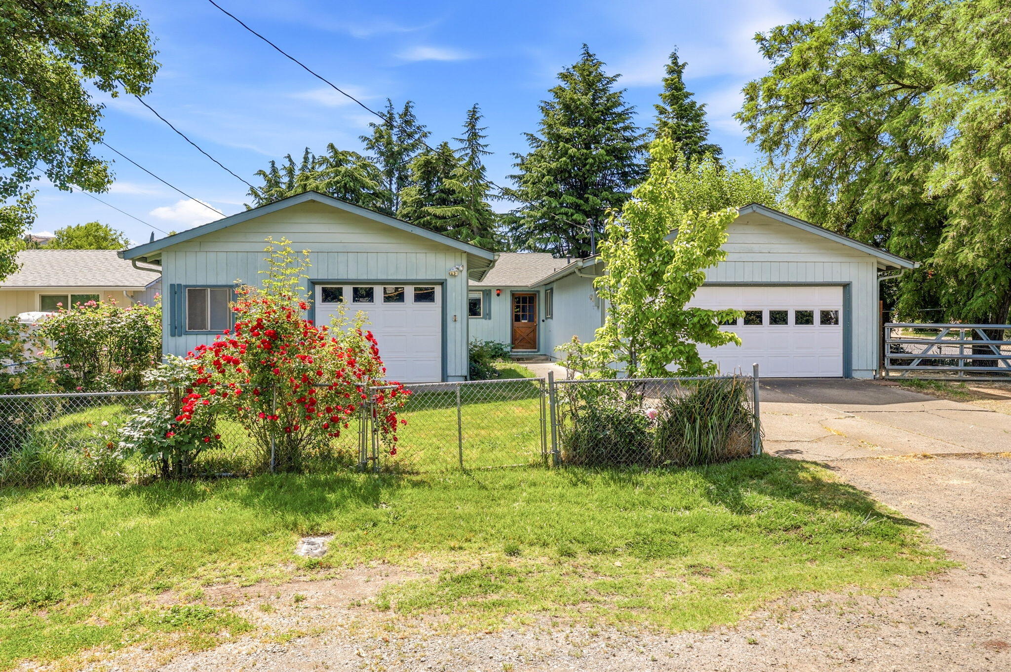 102 Elm Street Phoenix, OR 97535 - Photo 5 of 28 a front view of house with yard and green space