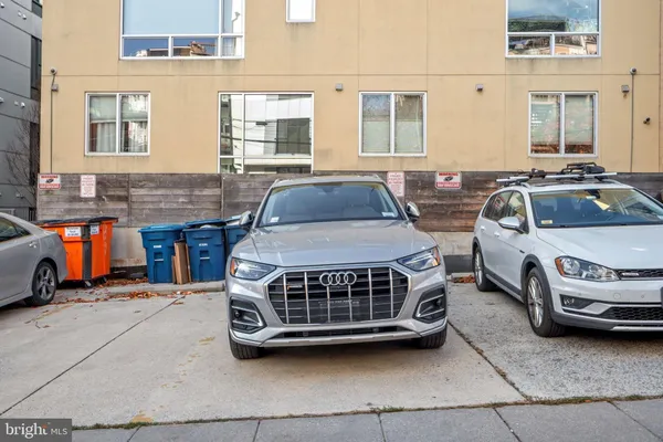 a view of a patio with couches and a potted plant