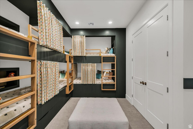 2608 Canyon Ridge Drive St. George, UT 84770 - Photo 62 of 86 Built-in bunk beds with individual privacy curtains, recessed lighting, and a soft carpeted floor