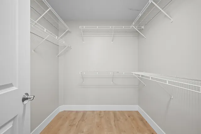 a view of a room with racks on the wall