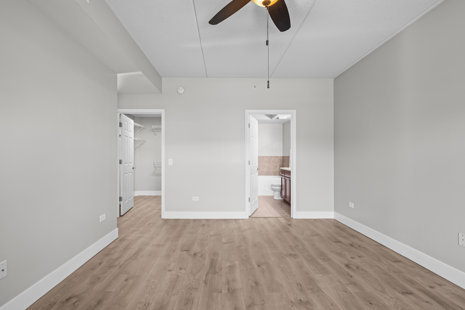 133 West Palatine Road, Unit 107A Palatine, IL 60067 - Photo 16 of 21 a view of empty room with wooden floor