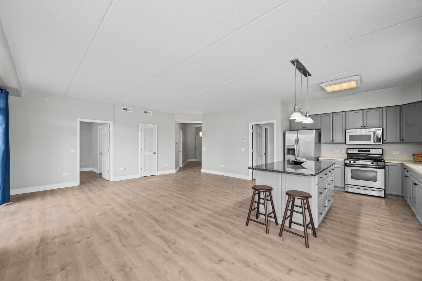 133 West Palatine Road, Unit 107A Palatine, IL 60067 - Photo 9 of 16 a view of kitchen with sink microwave and stove