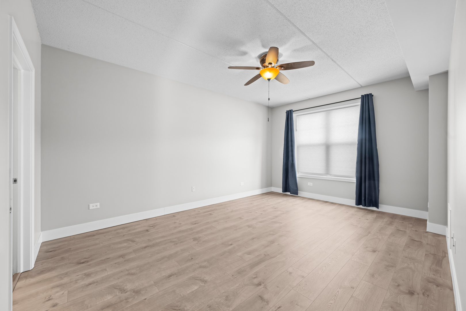 133 West Palatine Road, Unit 107A Palatine, IL 60067 - Photo 10 of 16 a view of an empty room and window