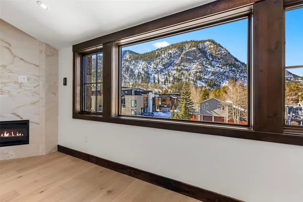 a view of a room with a large window