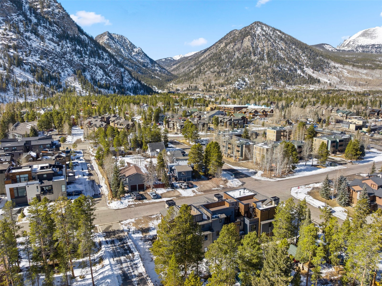 312 3rd Avenue, Unit 1 Frisco, CO 80443 - Photo 2 of 42 a view of a city with tall buildings