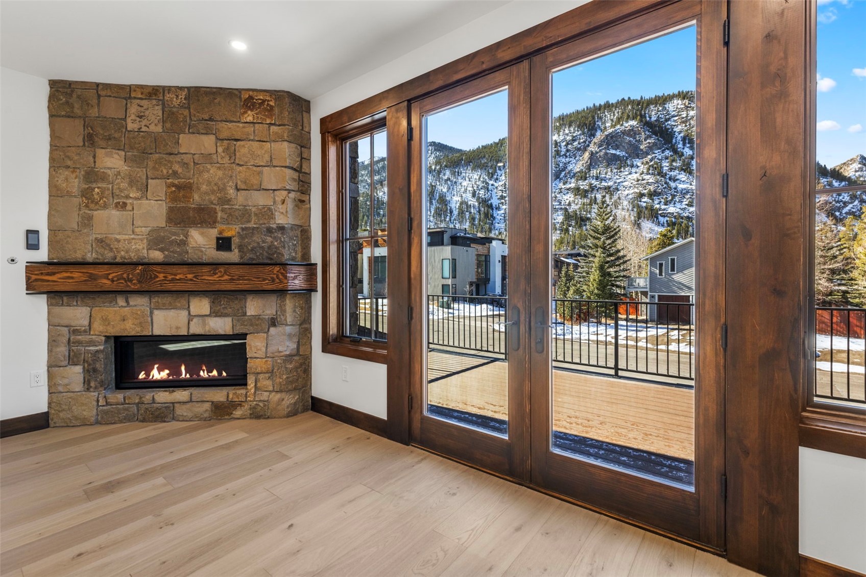 312 3rd Avenue, Unit 1 Frisco, CO 80443 - Photo 9 of 42 Stone fireplace with custom mantel.